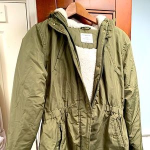 Primark army green girls jacket size 14-15 military style with Sherpa interior.